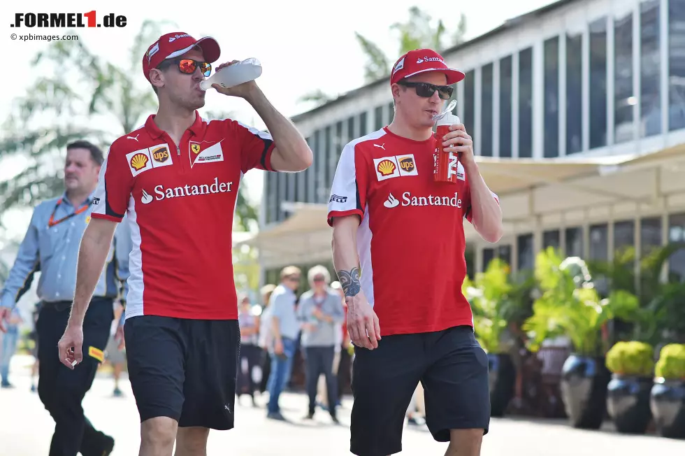 Foto zur News: Sebastian Vettel (Ferrari) und Kimi Räikkönen (Ferrari)