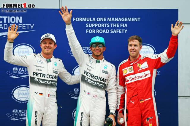 Foto zur News: Dahinter freuten sich Sebastian Vettel und Nico Rosberg über die Plätze zwei und drei