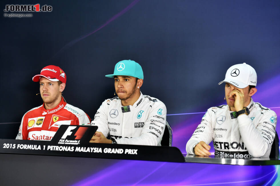 Foto zur News: Sebastian Vettel (Ferrari), Lewis Hamilton (Mercedes) und Nico Rosberg (Mercedes)