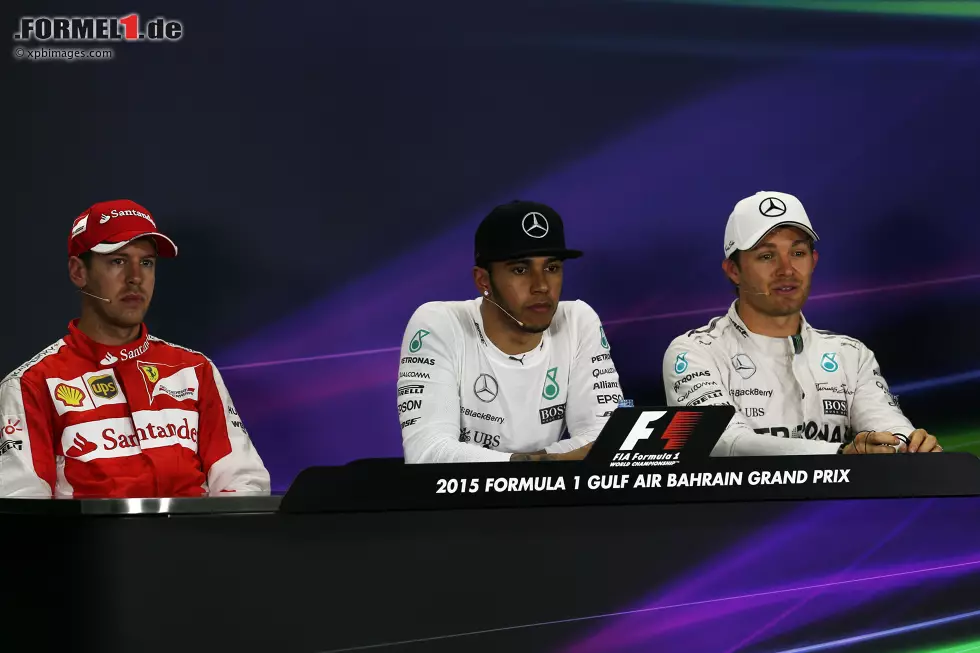 Foto zur News: Sebastian Vettel (Ferrari), Lewis Hamilton (Mercedes) und Nico Rosberg (Mercedes)