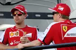 Foto zur News: Sebastian Vettel und Kimi Räikkönen (Ferrari)