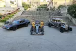 Foto zur News: Romain Grosjean (Lotus) und Pastor Maldonado (Lotus) - und ein Formel-1-Auto im Mad-Max-Design