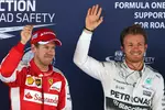 Foto zur News: Sebastian Vettel (Ferrari) und Nico Rosberg (Mercedes)