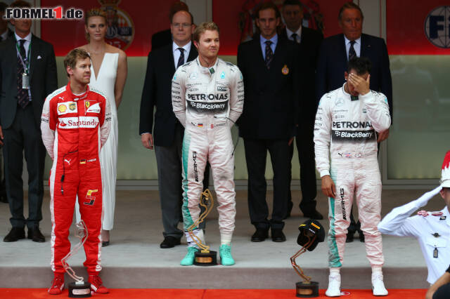 Foto zur News: Nico Rosberg, Sebastian Vettel und ein enttäuschter Lewis Hamilton