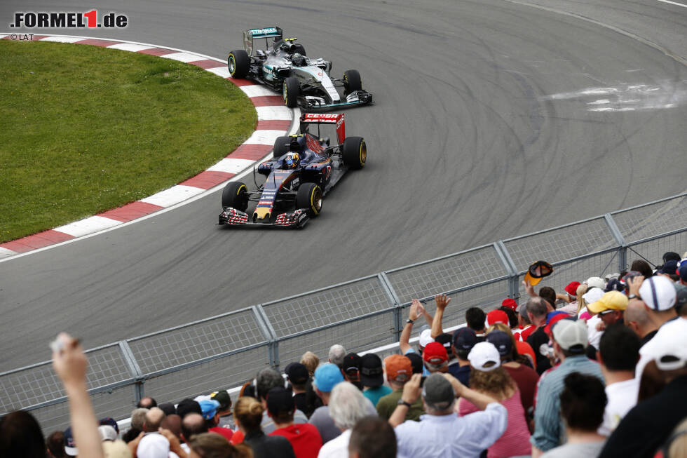 Foto zur News: Daniil Kwjat (Red Bull) und Nico Rosberg (Mercedes)