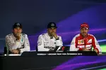 Foto zur News: Nico Rosberg (Mercedes), Lewis Hamilton (Mercedes) und Sebastian Vettel (Ferrari)