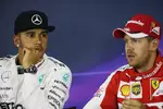 Foto zur News: Lewis Hamilton (Mercedes) und Sebastian Vettel (Ferrari)