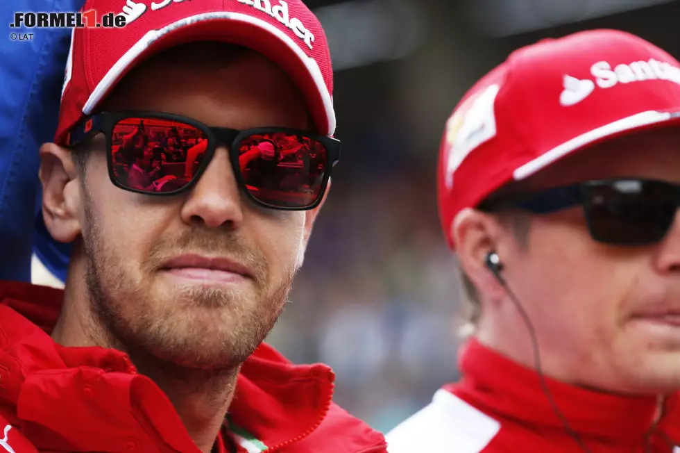 Foto zur News: Sebastian Vettel (Ferrari) und Kimi Räikkönen (Ferrari)