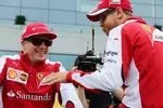 Foto zur News: Sebastian Vettel (Ferrari) und Kimi Räikkönen (Ferrari)