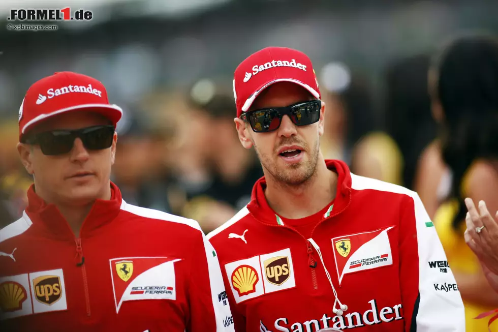 Foto zur News: Sebastian Vettel (Ferrari) und Kimi Räikkönen (Ferrari)