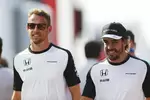 Foto zur News: Jenson Button (McLaren) und Fernando Alonso (McLaren)