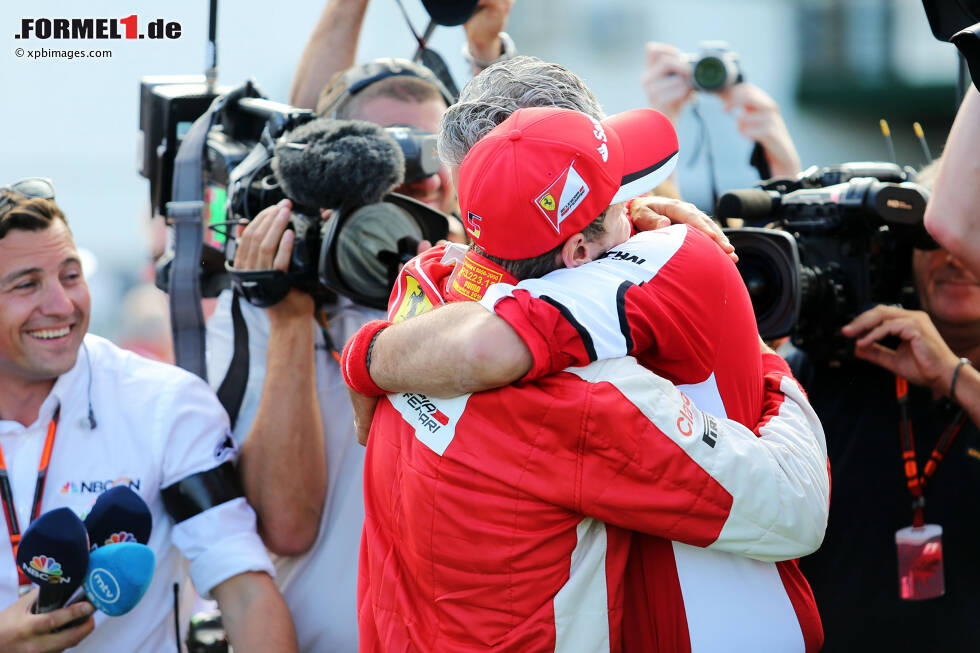 Foto zur News: Sebastian Vettel (Ferrari) und Maurizio Arrivabene