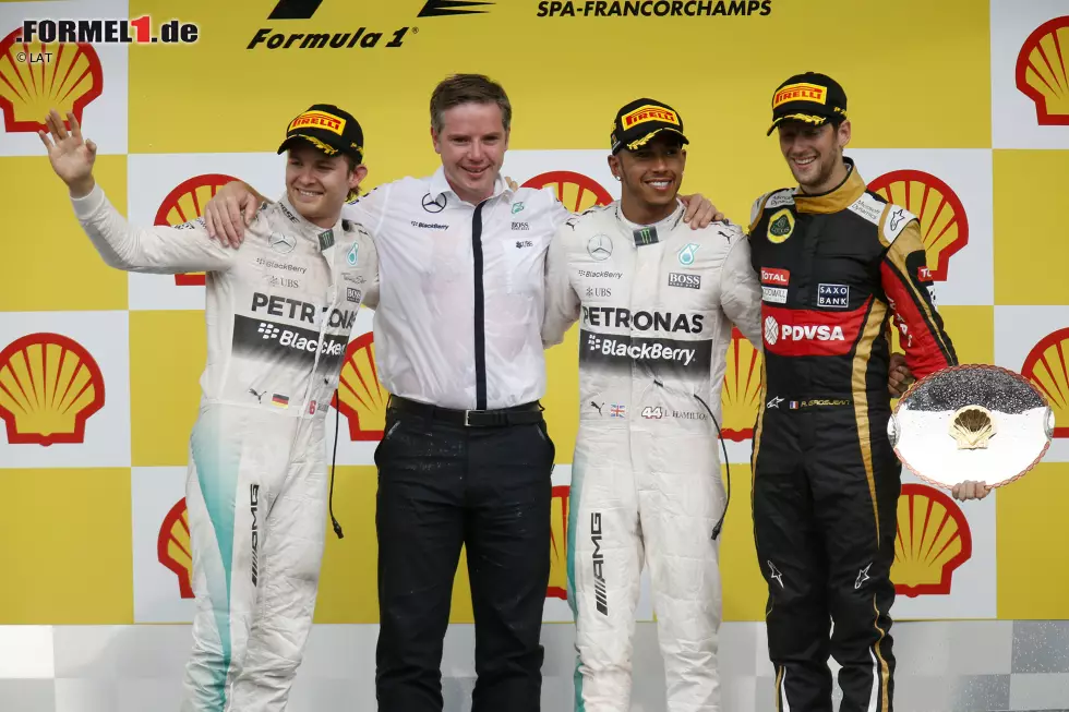 Foto zur News: Nico Rosberg (Mercedes), Lewis Hamilton (Mercedes) und Romain Grosjean (Lotus)