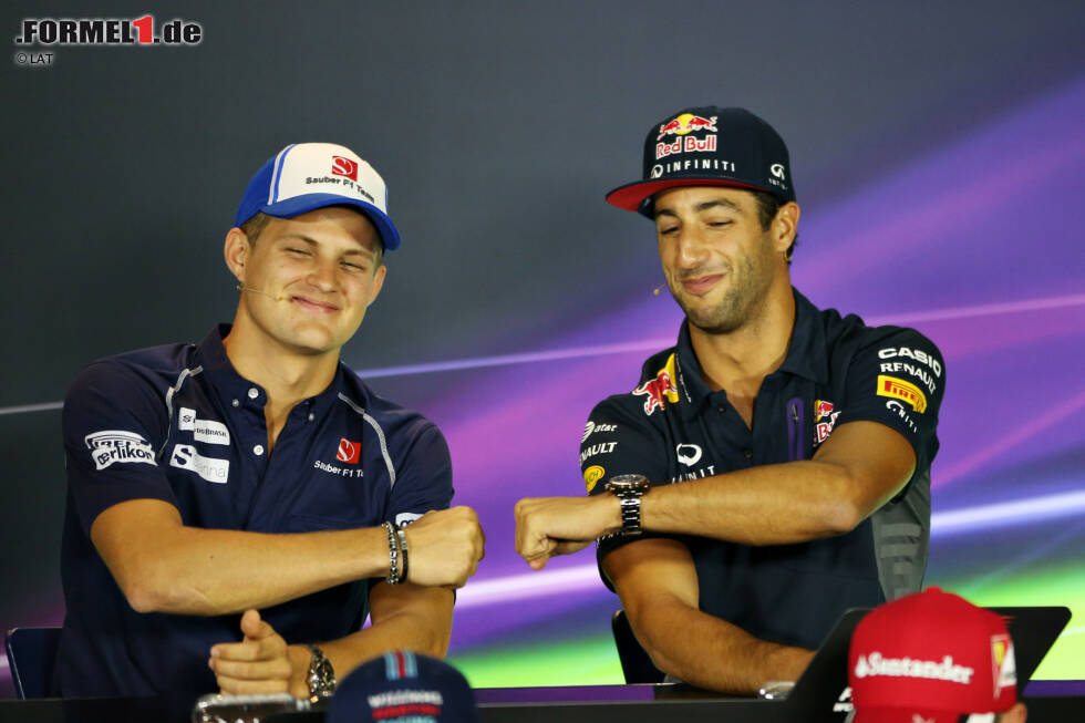 Foto zur News: Marcus Ericsson (Sauber) und Daniel Ricciardo (Red Bull)