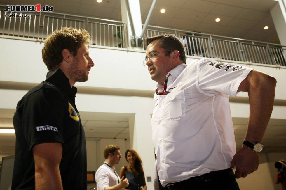 Foto zur News: Romain Grosjean (Lotus) und Eric Boullier (McLaren)