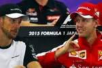 Foto zur News: Jenson Button (McLaren) und Sebastian Vettel (Ferrari)