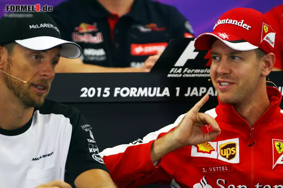 Foto zur News: Jenson Button (McLaren) und Sebastian Vettel (Ferrari)