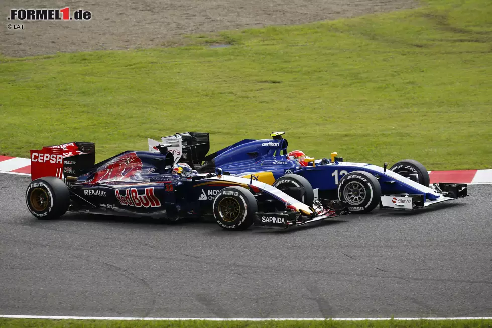 Foto zur News: Felipe Nasr (Sauber) und Max Verstappen (Toro Rosso)