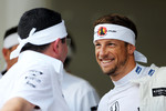 Foto zur News: Eric Boullier und Jenson Button (McLaren)