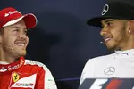 Foto zur News: Sebastian Vettel (Ferrari) und Lewis Hamilton (Mercedes)