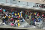 Foto zur News: Fans auf den Tribünen