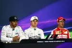 Foto zur News: Lewis Hamilton (Mercedes), Nico Rosberg (Mercedes) und Sebastian Vettel (Ferrari)