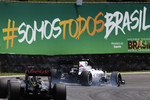 Foto zur News: Valtteri Bottas (Williams) und Romain Grosjean (Lotus)