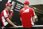 Foto zur News: Sebastian Vettel (Ferrari) und Kimi Räikkönen (Ferrari)