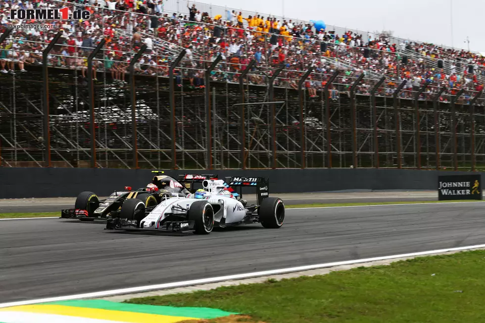 Foto zur News: Felipe Massa (Williams) und Romain Grosjean (Lotus)