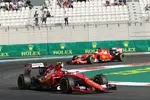 Foto zur News: Sebastian Vettel (Ferrari) und Kimi Räikkönen (Ferrari)