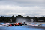 Foto zur News: Sebastian Vettel (Ferrari) und Stoffel Vandoorne