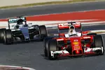 Foto zur News: Sebastian Vettel (Ferrari) und Nico Rosberg (Mercedes)