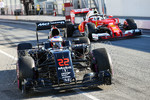 Foto zur News: Jenson Button (McLaren) und Sebastian Vettel (Ferrari)