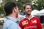 Foto zur News: Christian Horner (Red Bull) und Sebastian Vettel (Ferrari)