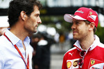 Foto zur News: Mark Webber und Sebastian Vettel (Ferrari)