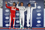 Foto zur News: Nico Rosberg (Mercedes), Sebastian Vettel (Ferrari) und Valtteri Bottas (Williams)