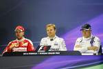Foto zur News: Sebastian Vettel (Ferrari), Nico Rosberg (Mercedes) und Valtteri Bottas (Williams)