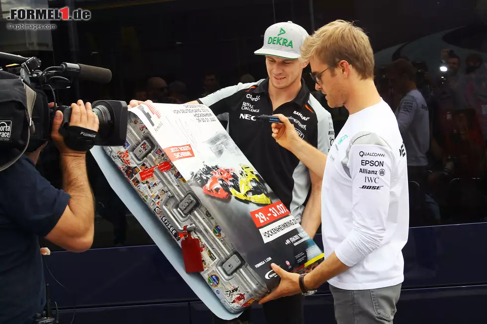 Foto zur News: Nico Hülkenberg (Force India) und Nico Rosberg (Mercedes)