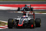 Foto zur News: Romain Grosjean (Haas) und Nico Rosberg (Mercedes)