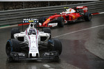 Foto zur News: Valtteri Bottas (Williams) und Kimi Räikkönen (Ferrari)