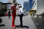 Foto zur News: Bernie Ecclestone und Maurizio Arrivabene