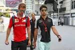 Foto zur News: Sebastian Vettel (Ferrari) und Sergio Perez (Force India)