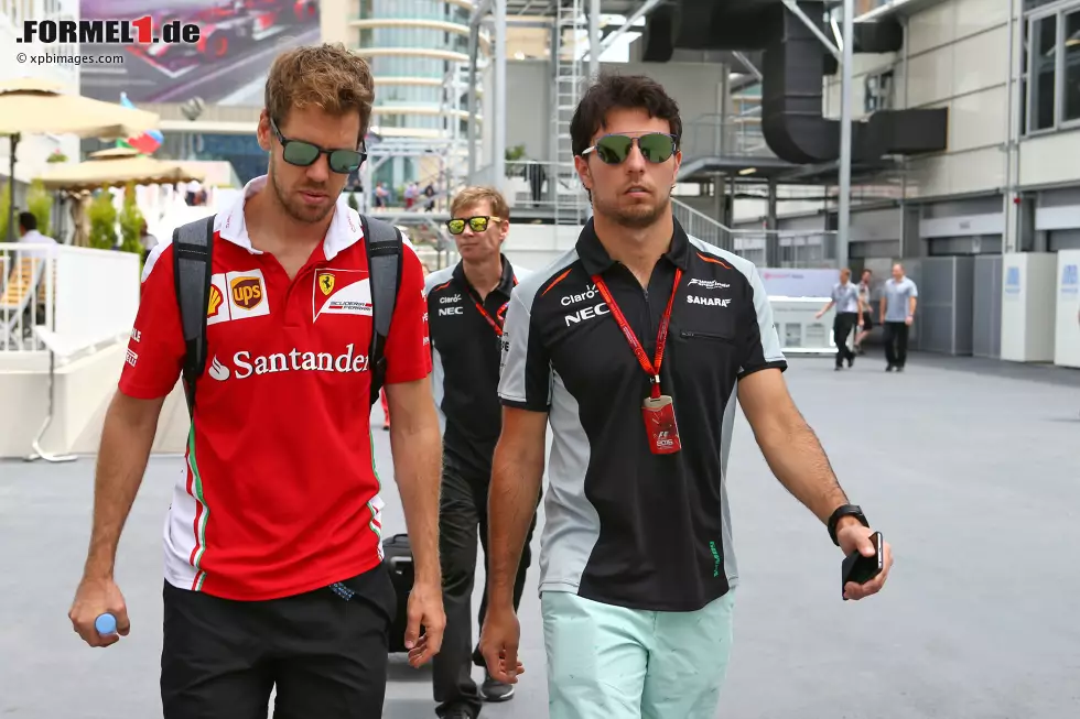 Foto zur News: Sebastian Vettel (Ferrari) und Sergio Perez (Force India)