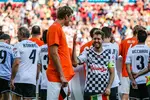 Foto zur News: Dirk Nowitzki und Sebastian Vettel (Ferrari)