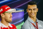 Foto zur News: Sebastian Vettel (Ferrari) und Pascal Wehrlein (Manor)