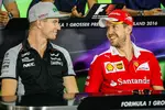 Foto zur News: Nico Hülkenberg (Force India) und Sebastian Vettel (Ferrari)