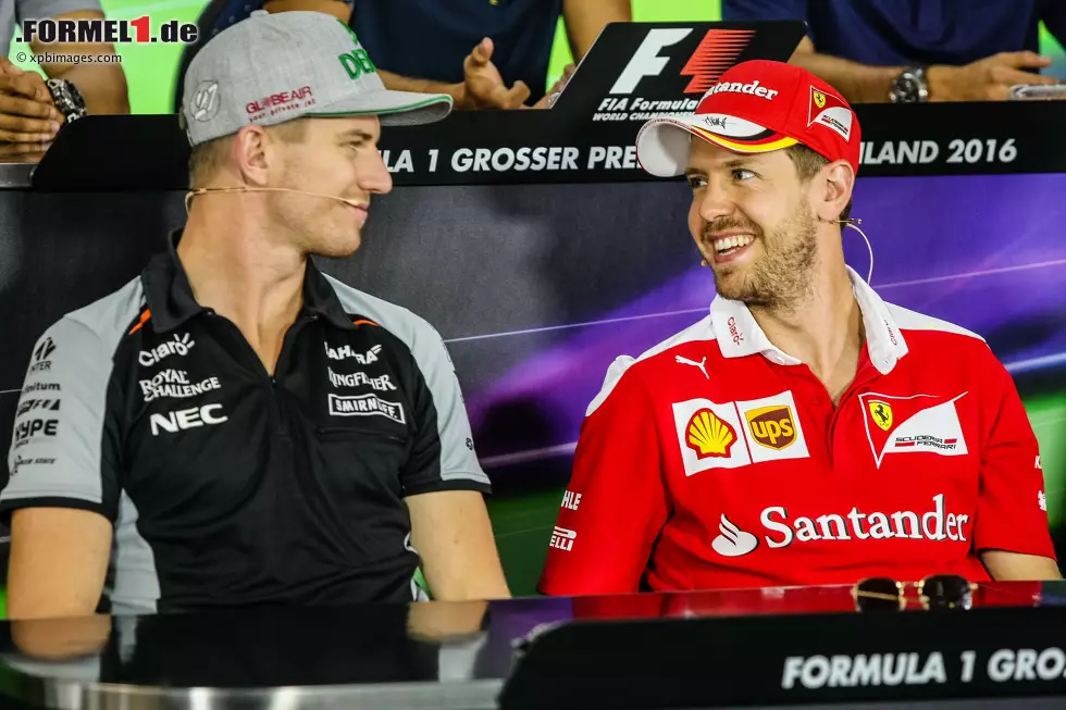 Foto zur News: Nico Hülkenberg (Force India) und Sebastian Vettel (Ferrari)