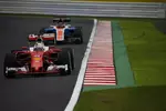 Foto zur News: Sebastian Vettel (Ferrari) und Pascal Wehrlein (Manor)