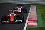 Foto zur News: Sebastian Vettel (Ferrari) und Pascal Wehrlein (Manor)