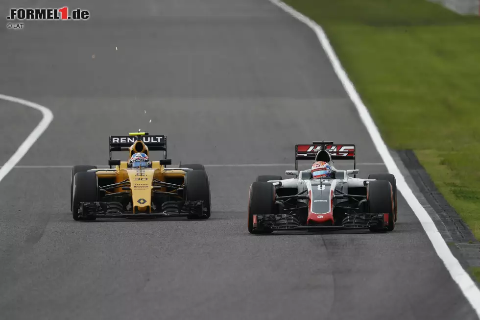 Foto zur News: Jolyon Palmer (Renault) und Romain Grosjean (Haas)